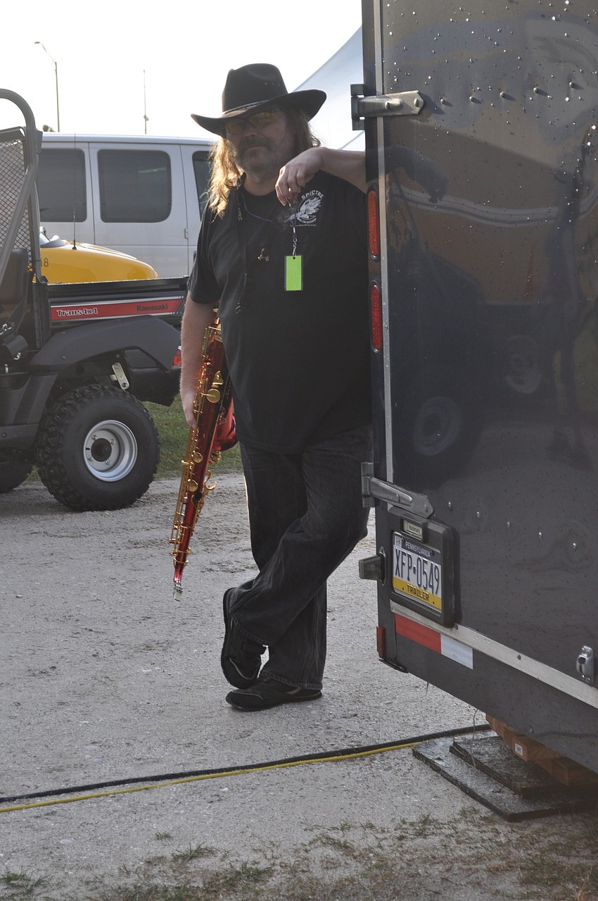 Jim Nelson of Jeff Cook & The AGB finds some solace before performing.