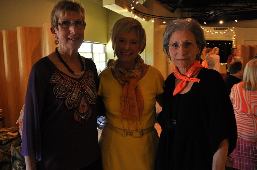 Volunteer Whitson-Schmidt with event organizers Christine Peak and Jane Bennett