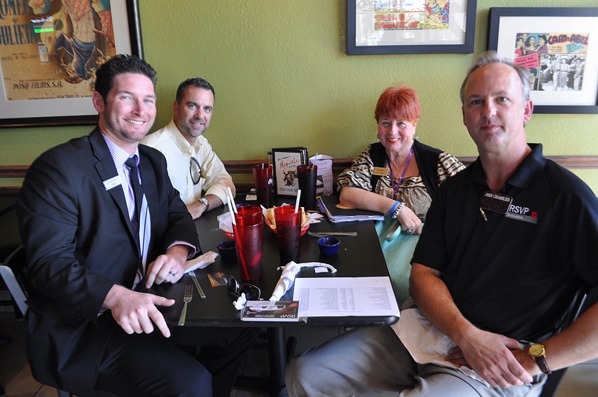 Clockwise from front, left: Ronnie Spears, of BB&T; Tony Campano, of Zirkelbach Construction; Janet Arena, of the Van Wezel; and John Chambliss, of RSVP Sarasota Manatee