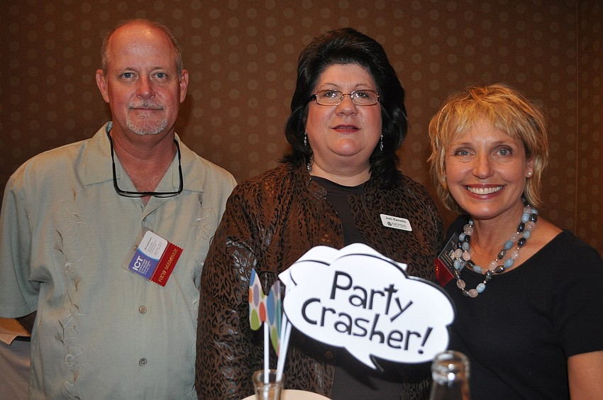 Bill Hinkelman of Intercoast Computer Technology, Joni Rametta of Nepsis Advisor Services and Sally Ullman of Sally Ullman Photography