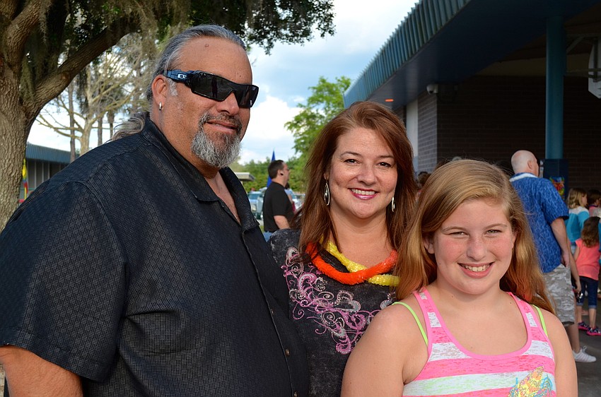 Joe Fenton, Marilyn Jennings and Olivia Dunn soak up the sun.