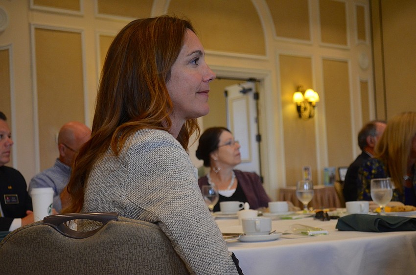 Guest speaker Justin Su'a's message intrigues Michelle Scala.