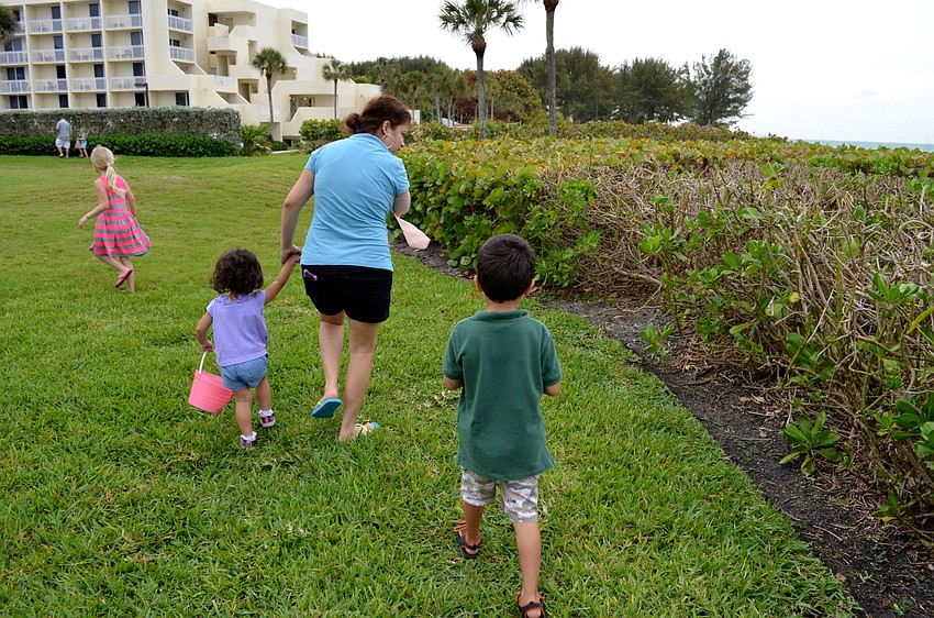 Kids and parents alike search for Easter eggs at Sand Cay.