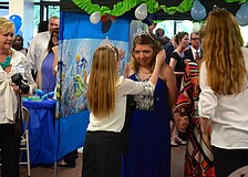 Caitlin Pfeifle receives a tiara to wear for the evening.