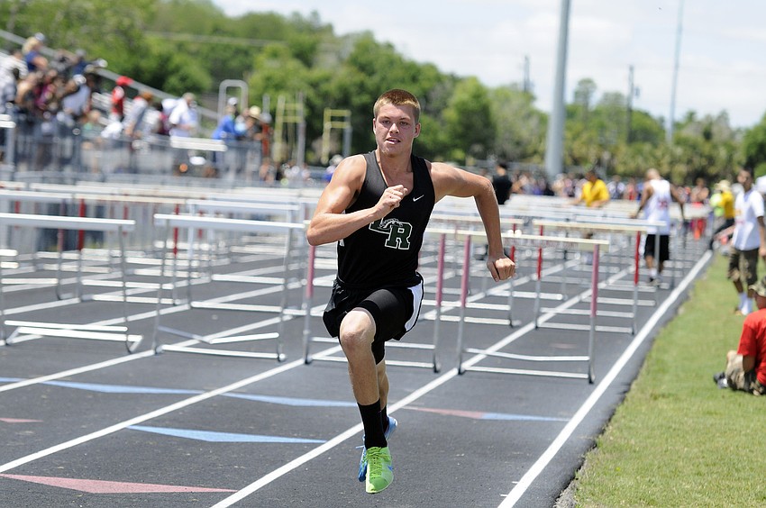 Lakewood Ranchâ€™s Couper Braun races to the finish line in the preliminaries of the 100-meter hurdles.