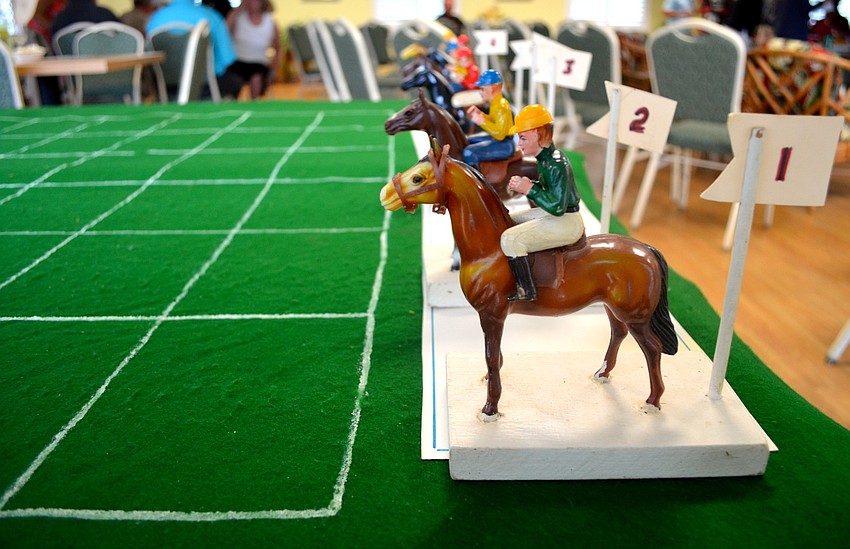 Residents of Spanish Main Yacht Club play their own betting game with a set that has been in the club for years.