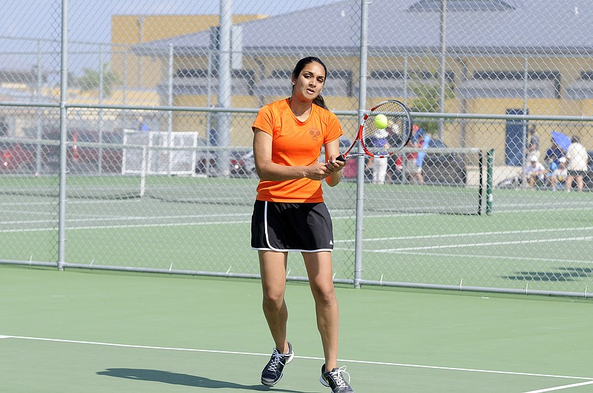 Sarasota Highâ€™s Mauna Rao returns a serve during her No. 2 doubles semifinal versus Lakewood Ranch.