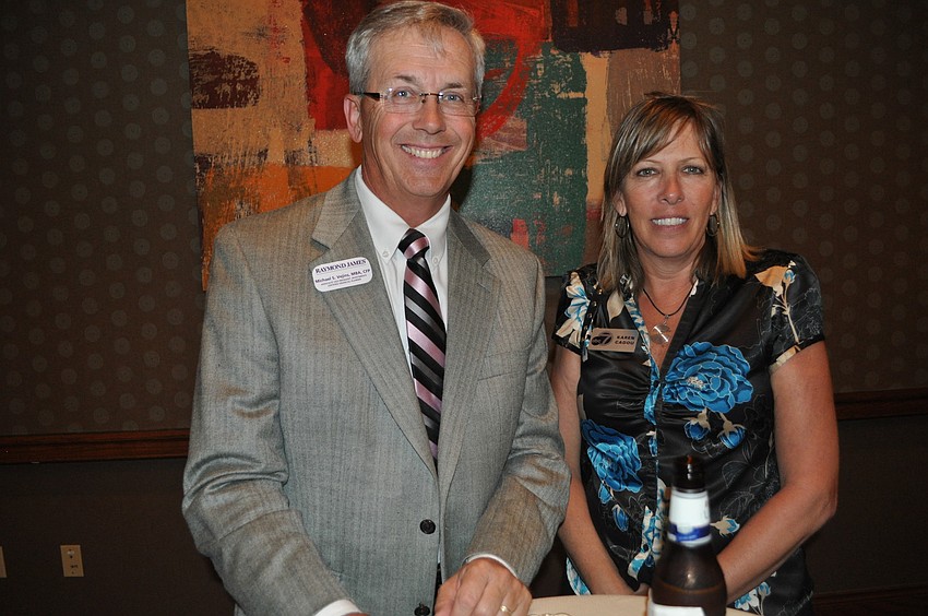 Michael Vejins of Raymond James and ABC 7â€™s Karen Cadou
