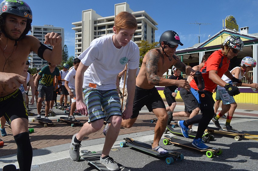 Skaters take off for the 13.6 â€“ mile race.