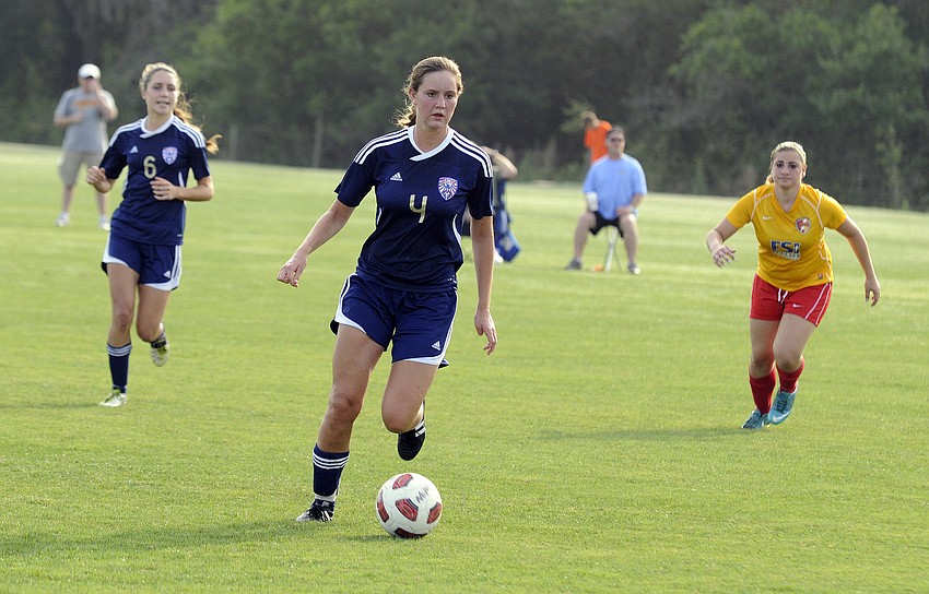 Mackenzie Weeks brings the ball down the field for the West Side Lady Eagles.