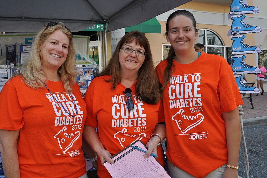 Lisa Biach, Edie Edwards and Krista Edwards signed people up to register to advocate for diabetes research.