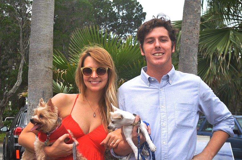 Emily Shaw and William Ball with their dogs, Gladys and Shrimp