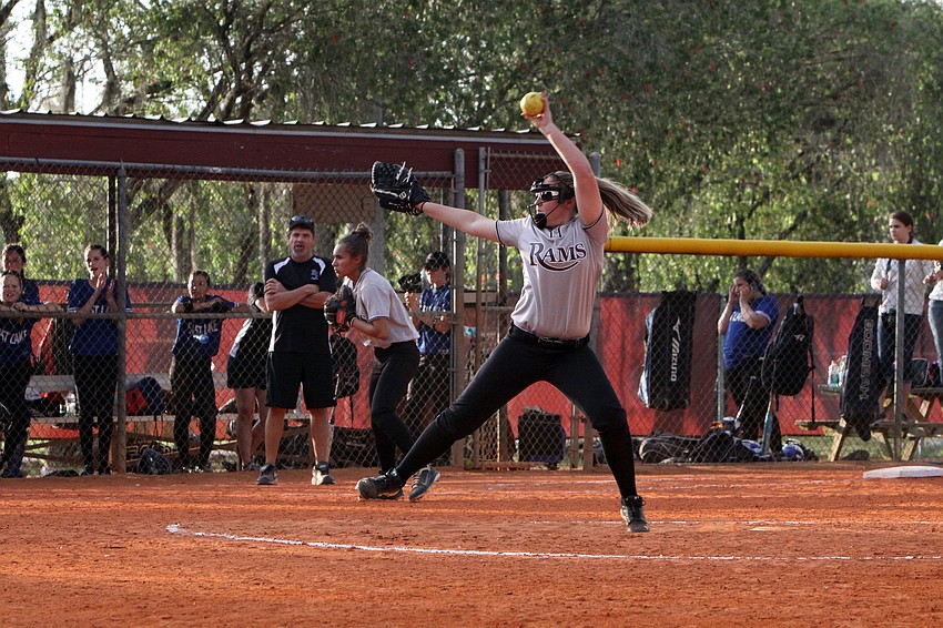 Riverviewâ€™s Deanna Stevens, 10, winds up to throw the ball towards home plate.