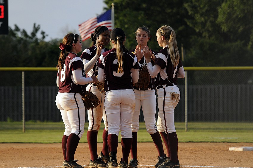 The Braden River High infield celebrates following on of pitcher Courtney Mirabellaâ€™s 15 strikeouts.