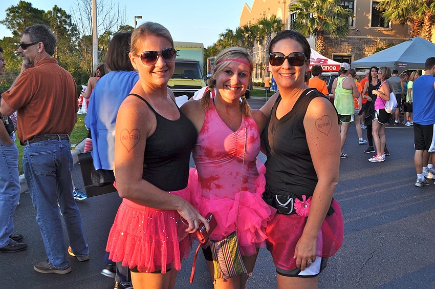 Stacey Hoey, Christy Stanford and Jen Peavley all had Boston written on their arms with hearts.