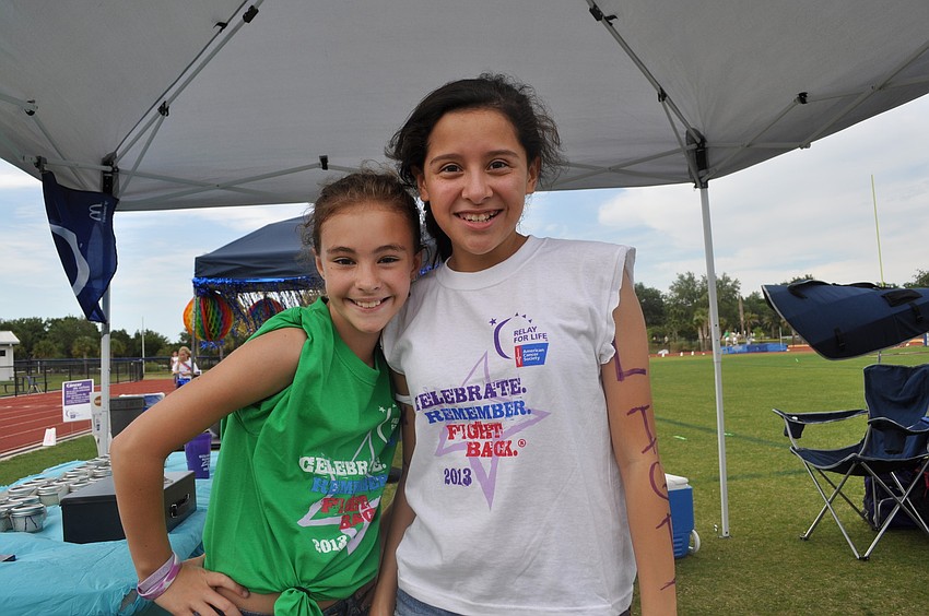 Out-of-Door sixth graders Sydney Hill and Jessica Navarro, co-captains of Team Lightening. The team raised $3,355.