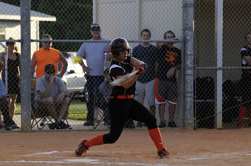 Sophomore Megan Custode makes contact.