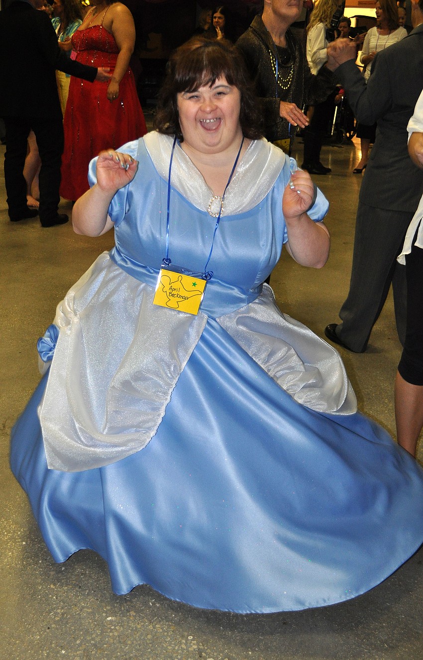 April Beckman has fun bopping around to the music.