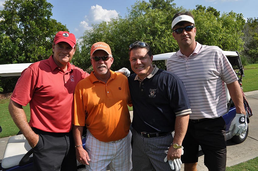Kip Radigan of Global Risk Solutions with Tom Baker, Chris Hugill and Dom DiMaio of Synovus Bank