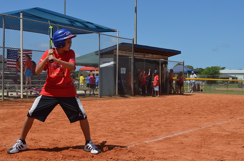 Sebastian Kovendy concentrates on hitting the ball.