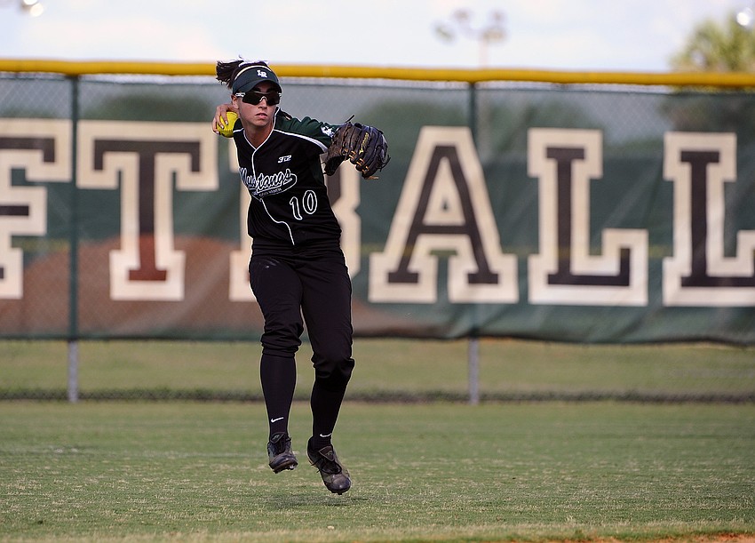 Lakewood Ranch center fielder Taylor Newton retrieves a ground ball and quickly throws it back to the infield.