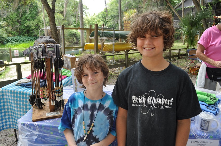 Kai Hunkeler bought a gator-tooth necklace with Silas Banyas.