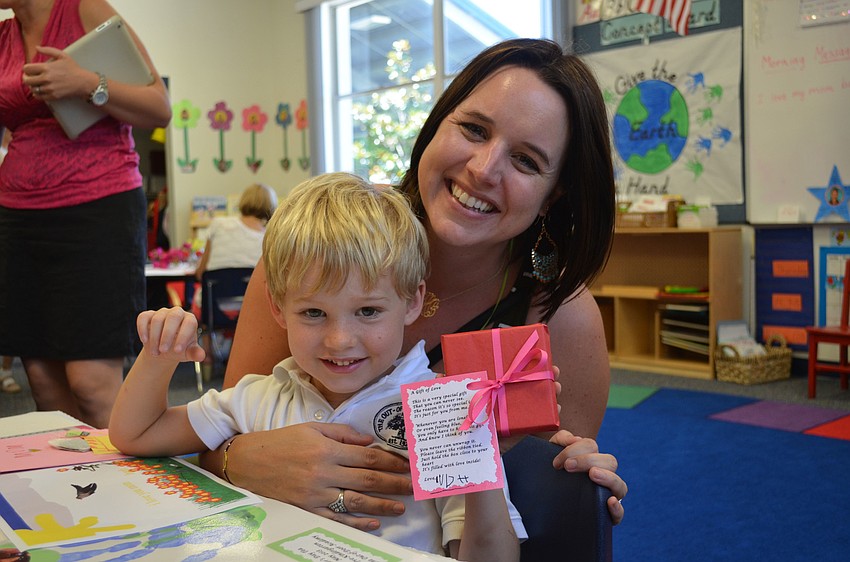 Christina sits with her son, Hugh.