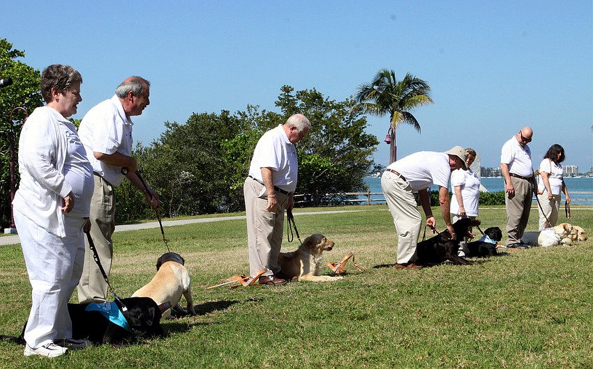 The graduates lined up before heading inside the Van Wezel for the graduation ceremony.