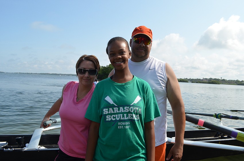 Kimia Spikes with her parents Shawn and Walter