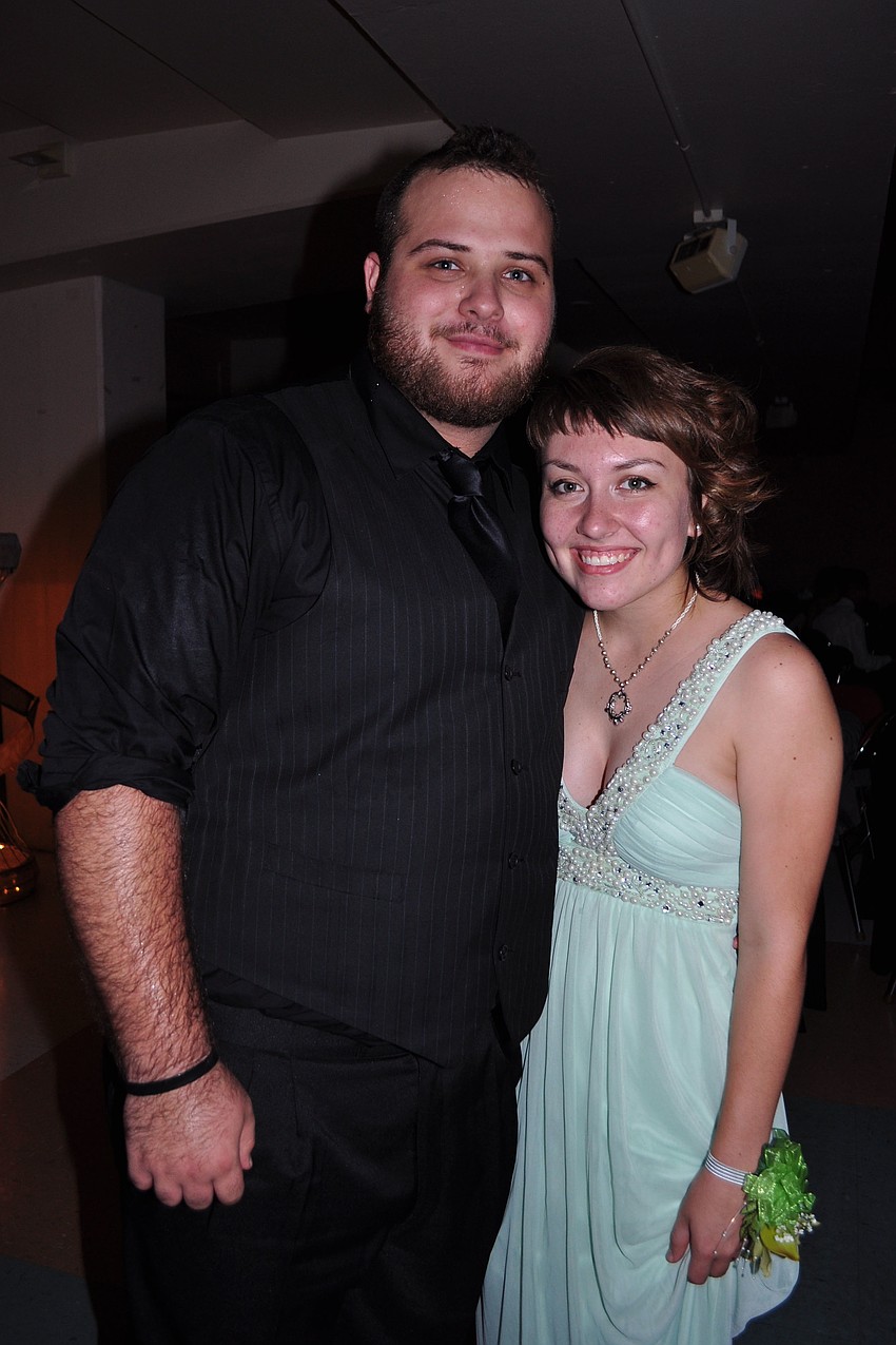 Graduate Chandler Fisher attended with senior Carley Mitchell.