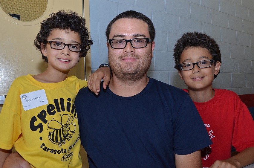 Third grader Lucas Garcia came to the spelling bee with his father Xavier and older brother Alex.