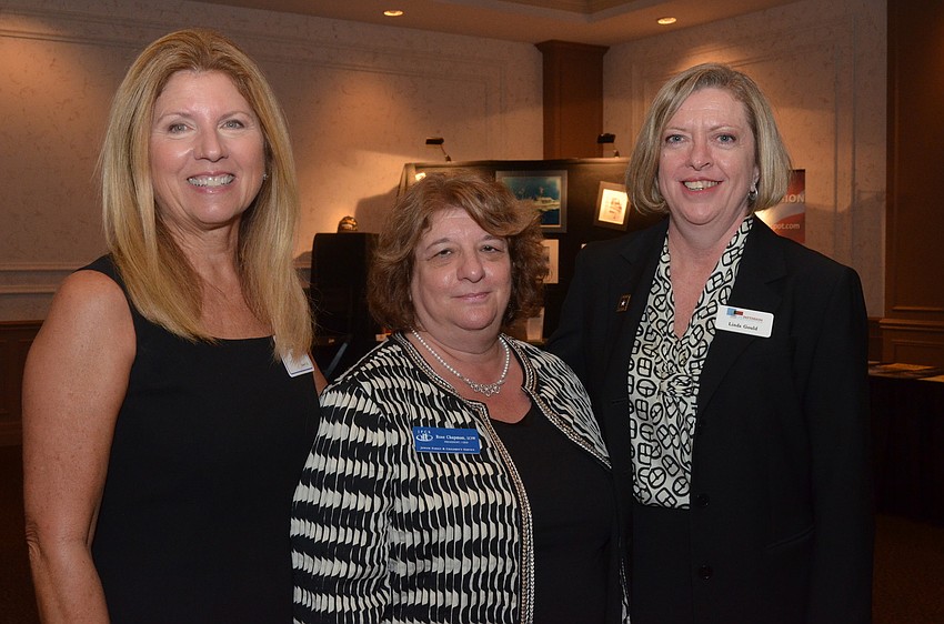 Linda Gould of the Patterson Foundation (far right) presented Sandra Frank of All Faiths Food Bank and Rose Chapman of Jewish Family and Children Services with $10,000 grants for each organization to continue their veteran services.
