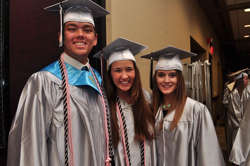 Commencement speakers Nathan Evens and Emily Mingote with Senior Class President Shelby Graves