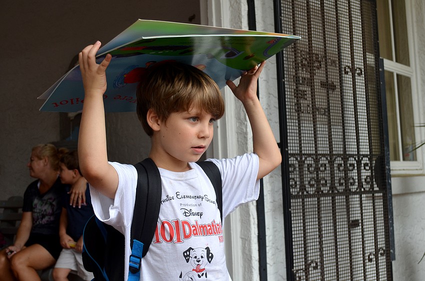 Children leave Southside Elementary for the bus stop on the last day of school.