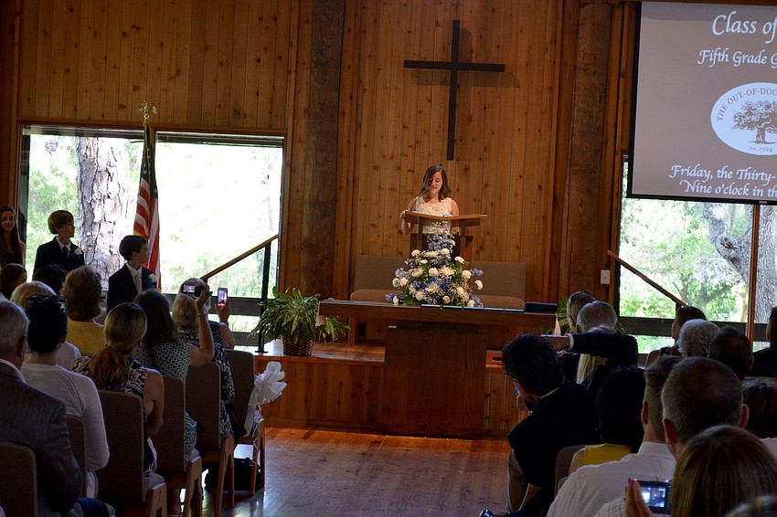 Chelsea speaks to the audience.