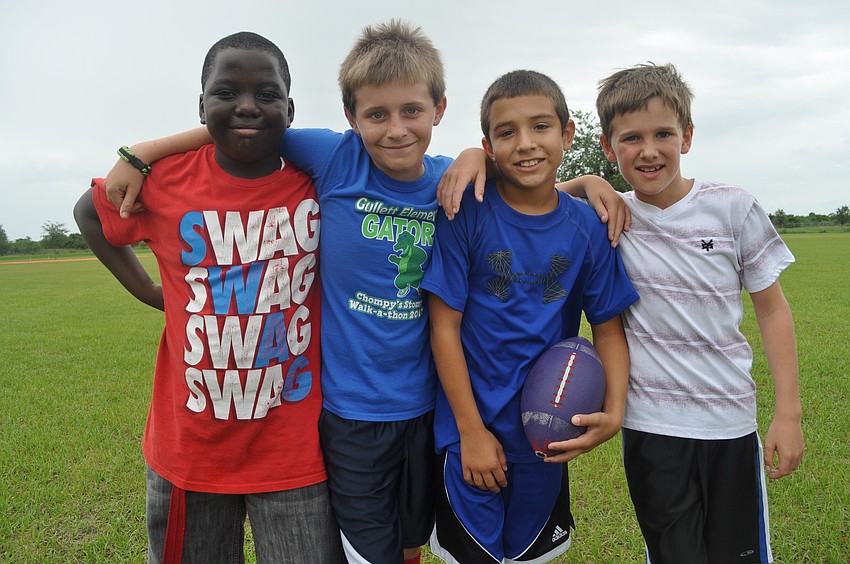 Forth-graders Jahmal Barnes, Dawson Britt, Josiah Lozada and Oliver Grimond