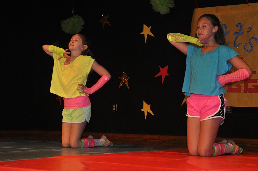 Katelyn Wilhoit and Ellie Bonnett performed gymnastics and danced.