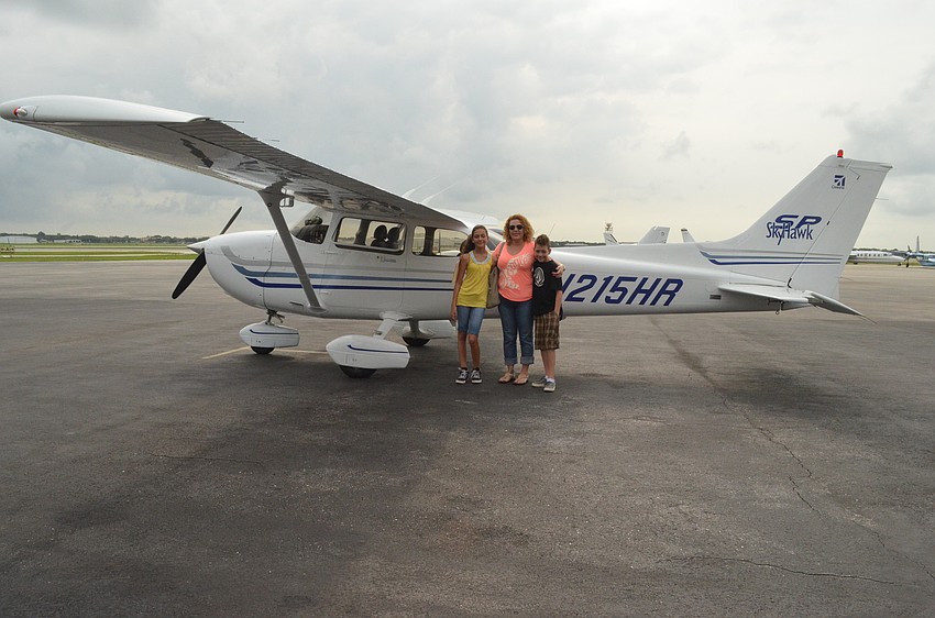Geovana Cribbs brought her children Denise, 12, and Hunter 10, to learn about aviation.