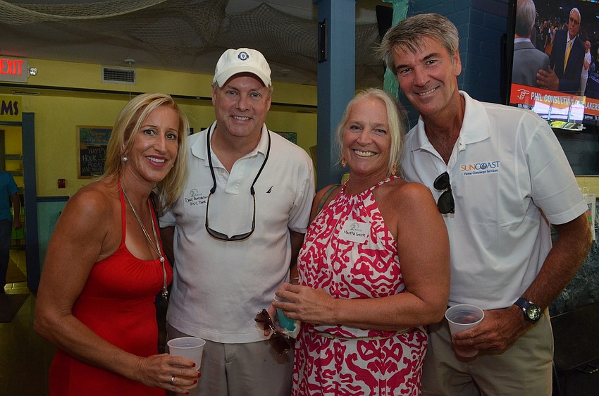 Cindy Bruce of Proforma, Dave Burkstaller of PNC Bank, Martha Smith of Le Gran Bisou and Joel Pye of Sun Coast Home Concierge