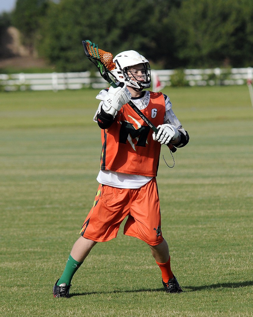 Zac Del Medico, 13, looks to pass the ball to an open teammate.