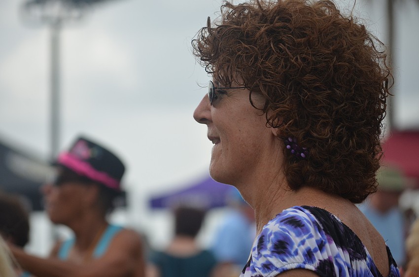 Angela Thompson has lived in Sarasota for the past 34 years. She dances to the Yesterdayze at the Friday Fest.