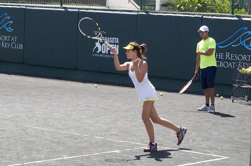 Maddie Allen, 13, holds her own on a court full of male campers.