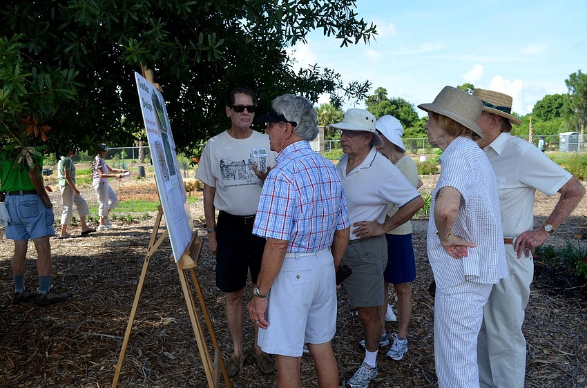 Guests admire an overview of the new park.