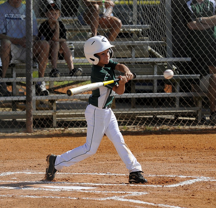 Lakewood Ranchâ€™s Connor Shine smacks an RBI single in the first inning against New Tampa.