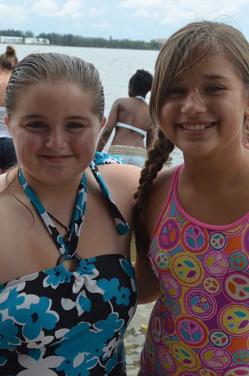 Ashley Winget and Zahara Stevens search for critters in Sarasota Bay.
