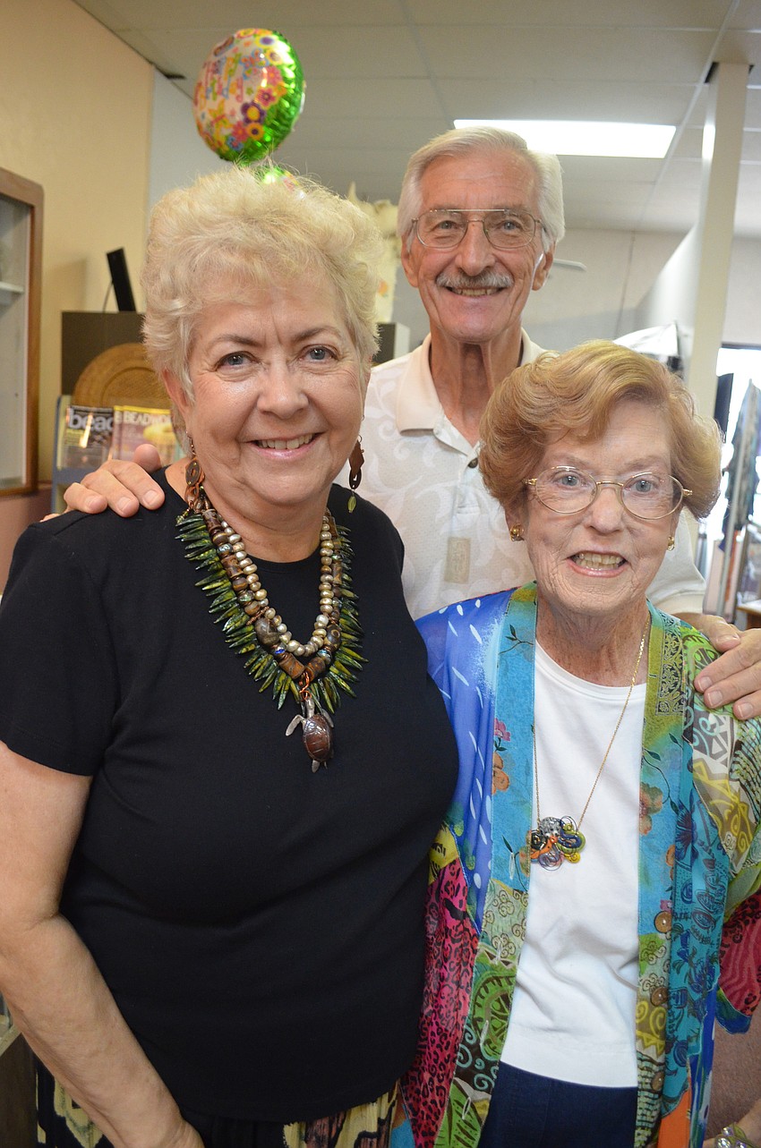 Marty Montague with friends and customers Dick and Nancy Grecni