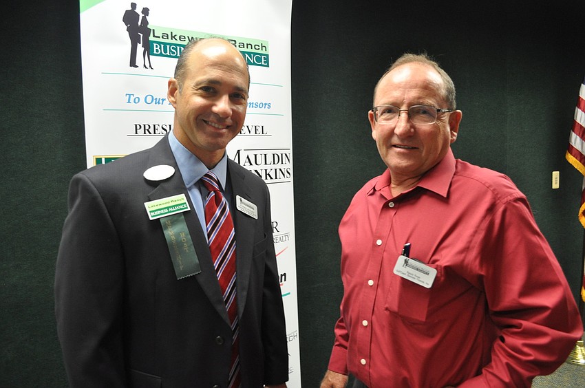 Stephen Ackoury of American Momentum Bank with Ron Reuss of GulfCoast Business Finance