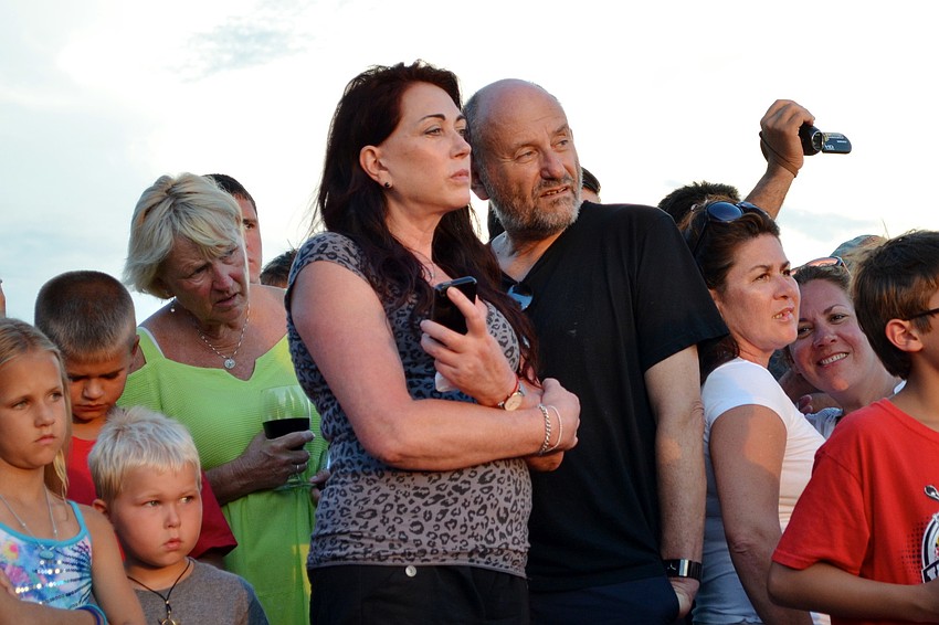 Spectators listen to Cyndi Seamonâ€™s instructions and explanation of what will happen during the nest opening.