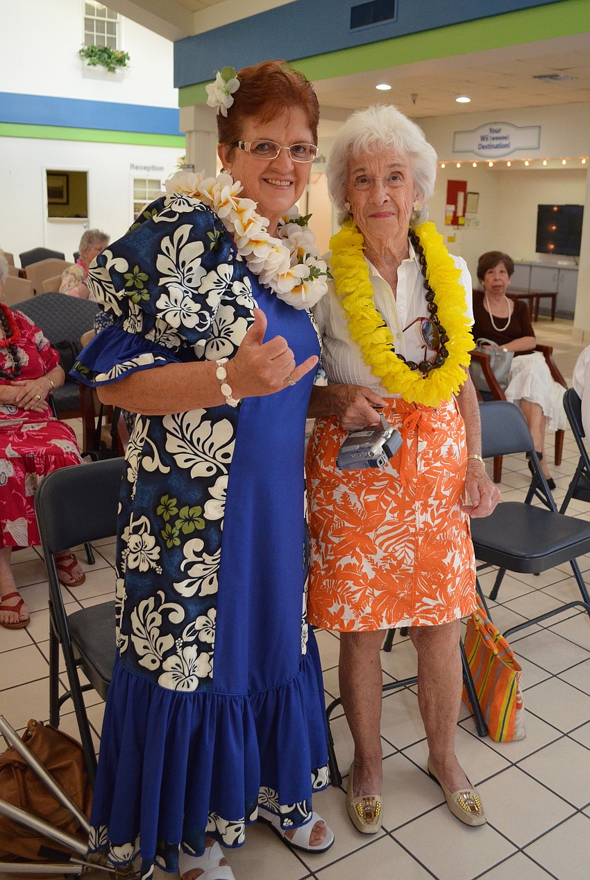 Arlene Rasfeld and Fran Frawley are ready for the Friendship Center luau.