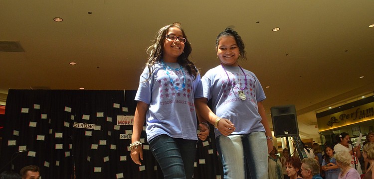 Adriana Alvarez and Rhean Stephens model self-confidence.